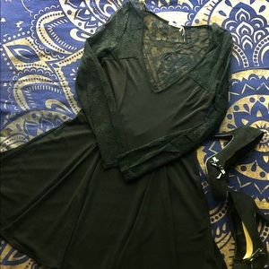 Black Long-sleeve, mid-thigh dress, lace accents